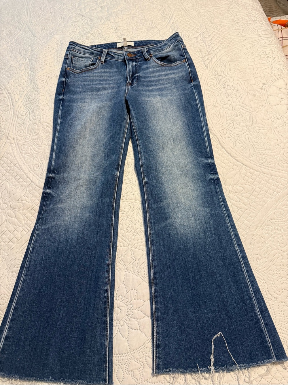 High-Rise Dark Blue Flare Jeans with Raw Hem